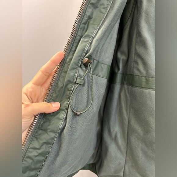 Athleta Alpine Air Vest with Removable Fur Hood in Army Green - Picture 6 of 14